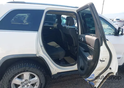 2012 Jeep Grand Cherokee Laredo из США, поврежденный, VIN 1C4RJFAG1CC107998